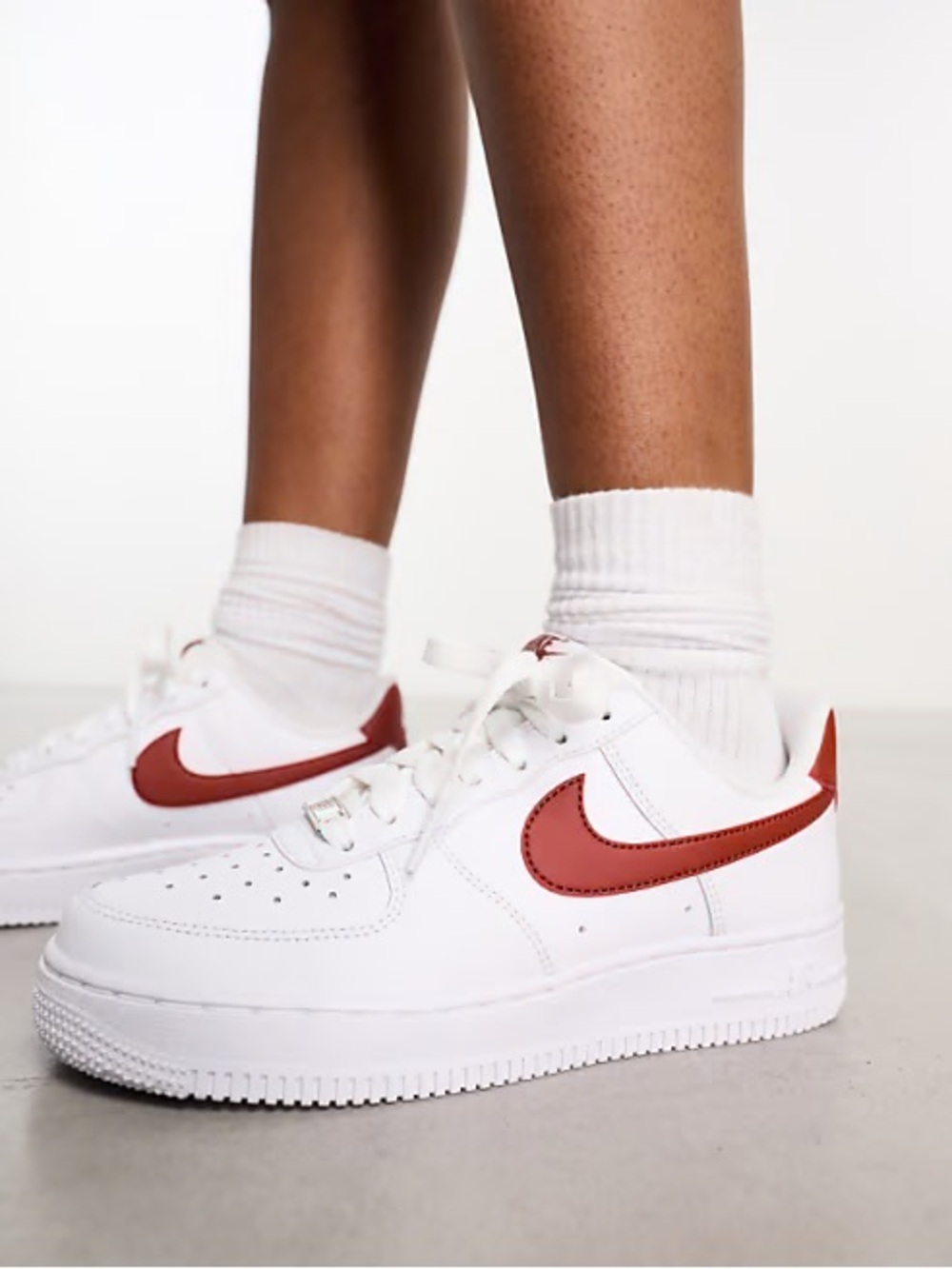 Nike Air Force 1 '07 sneakers in white and rust orange